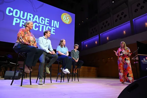 The Courage in Practice alumni panel on stage at the opening of the University of Twente's academic year